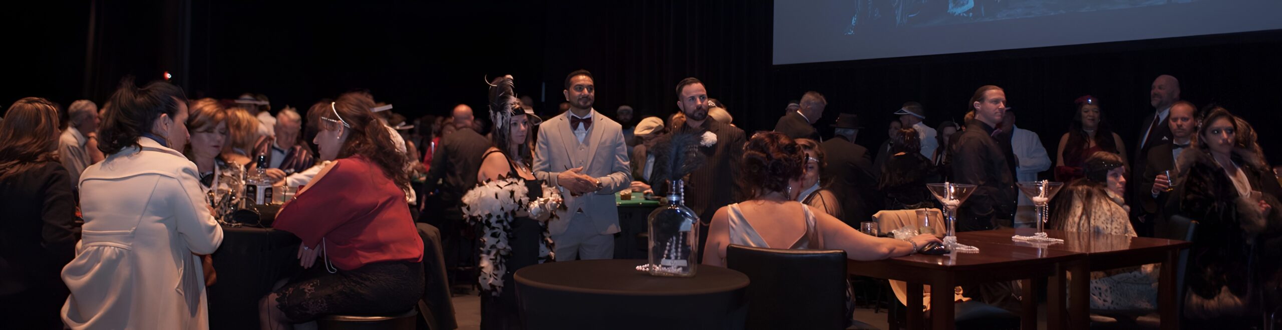 People socializing at a formal event.